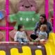 two toddlers in a safe indoor play area