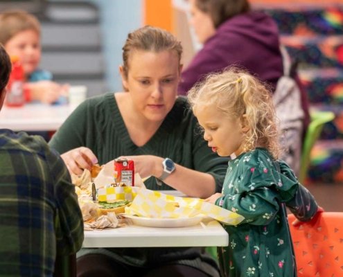 mom and daughter sharing a meal at Candeeland cafe