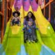 moms and kids on the slide